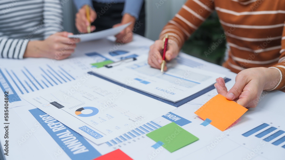 small business accounting team meeting three asian people with salary monthly charts data, basic business accounting and bookkeeping concept. small business accounting team meeting three asian people with salary monthly charts data, basic business accounting and bookkeeping concept.