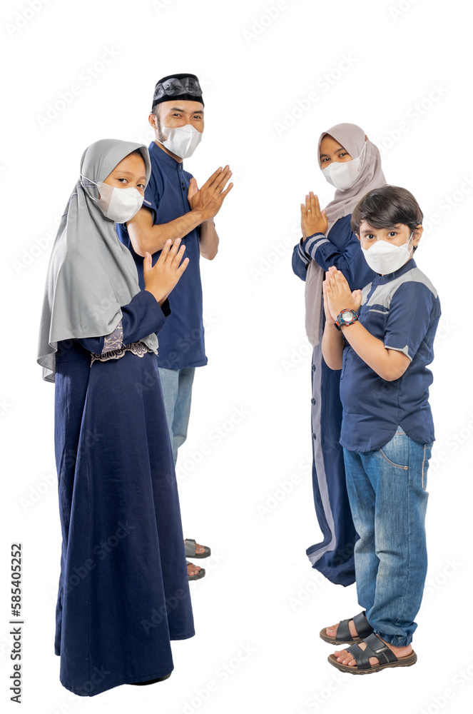 happy muslim asian family with greeting gesture wearing a face mask happy muslim asian family with greeting gesture wearing a face mask