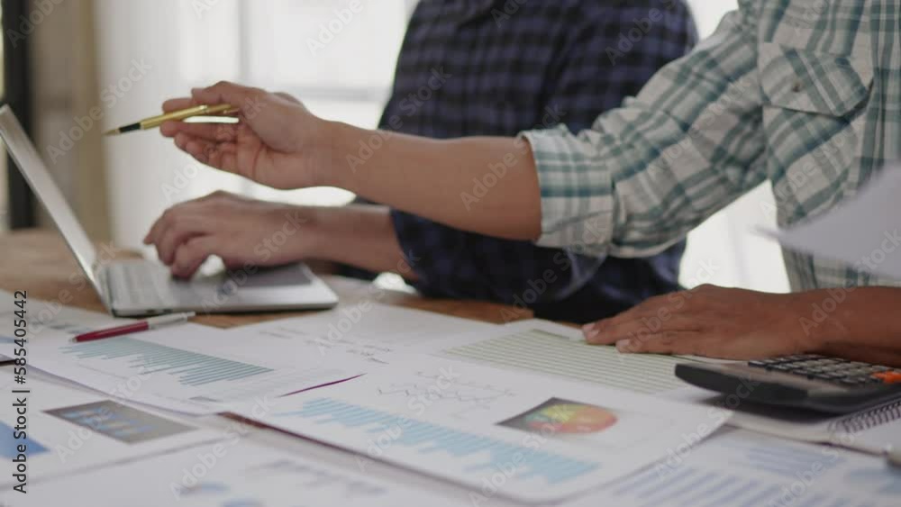 Close up of hands are working and brainstorming on paperworks about business financial and marketing. Close up of hands are working and brainstorming on paperworks about business financial and marketing.