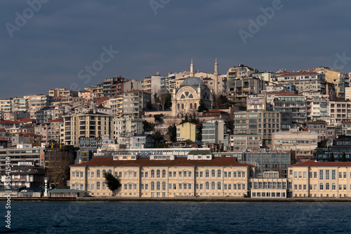 View of the Jihangir microdistrict of Beyoglu district in the European part of Istanbul from the water area of the Bosphorus on a sunny day, Istanbul, Turkey © Ula Ulachka