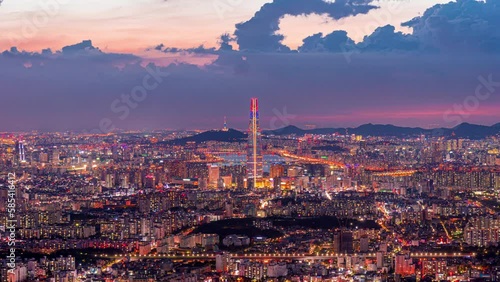 Time lapse 4k South Korea skyline of Seoul, Top view Sunset of Seoul and The best view of South Korea with Lotte world mall at Namhansanseong mountain. photo