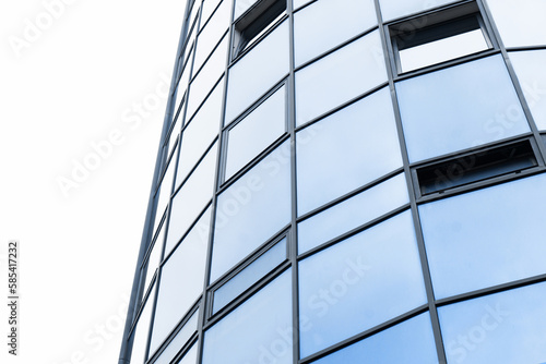 Office block texture. Glass skyscraper background. Glass window building. Business building pattern. Round shape design architecture. Blue glass background. Isolated on white.