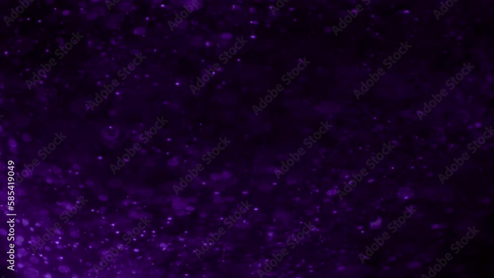 Transparent purple sparkling macro oil bubbles floating in fluid loop background. Concept 3D animation of abstract defocused magic transparent illuminated spheres as vj loop or festive luxury backdrop Transparent purple sparkling macro oil bubbles floating in fluid loop background. Concept 3D animation of abstract defocused magic transparent illuminated spheres as vj loop or festive luxury backdrop