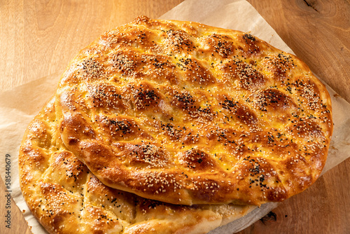 homemade pizza on wooden board, ramadan pita