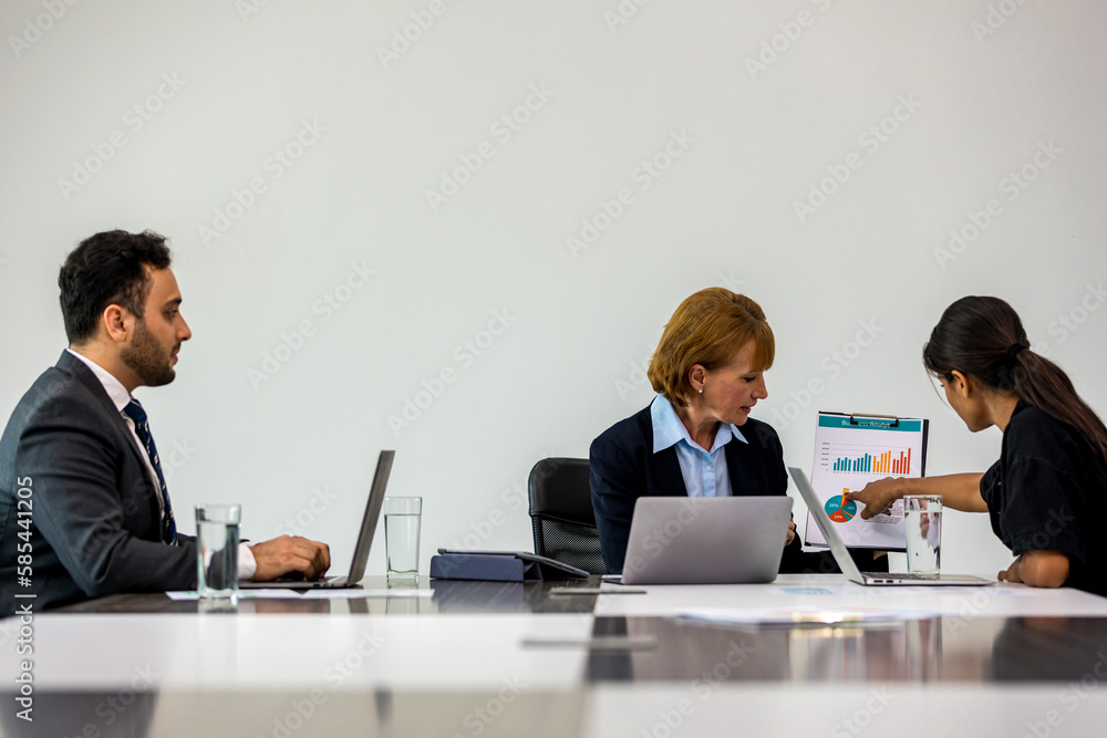 Diverse colleagues gather in brainstorm discuss statistics together. Group of people colleagues gather doing Brainstorming business plan together. Team Brainstorm Working Concept.