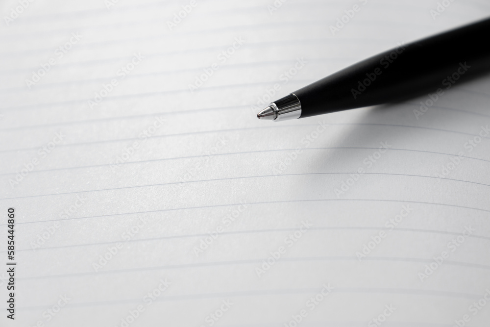 A pen placed on opened page of a book. After some edits. A pen placed on opened page of a book. After some edits.