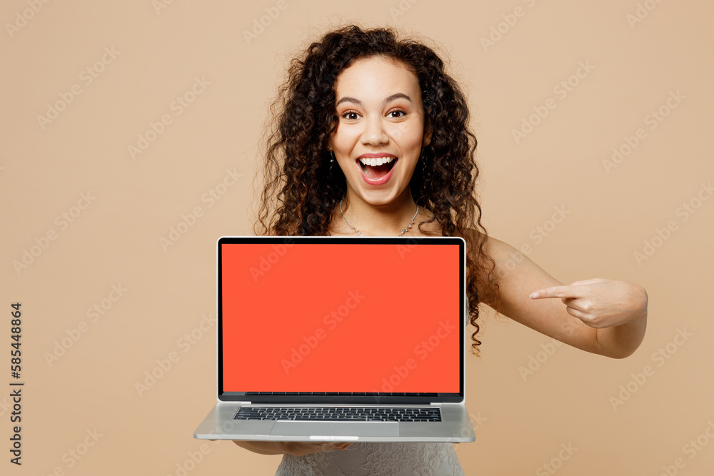 Happy young IT woman bride wear wedding dress posing hold use work point on blank screen workspace area laptop pc computer isolated on plain beige background studio Ceremony celebration party concept Happy young IT woman bride wear wedding dress posing hold use work point on blank screen workspace area laptop pc computer isolated on plain beige background studio Ceremony celebration party concept