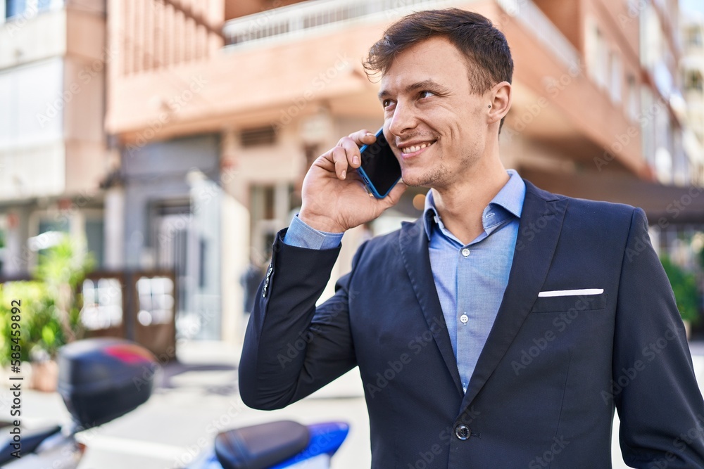 Young man business worker smiling confident talking on smartphone at street Young man business worker smiling confident talking on smartphone at street