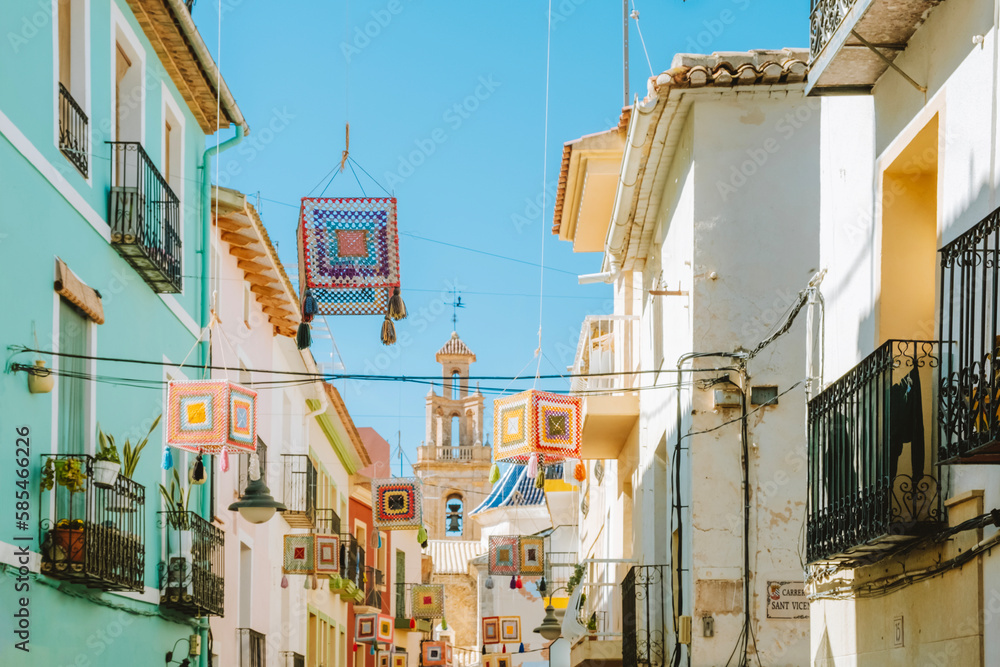 Finestrat, Alicante province, Spain. Beautiful quiet narrow street of small Finestrat village old town at sunny day