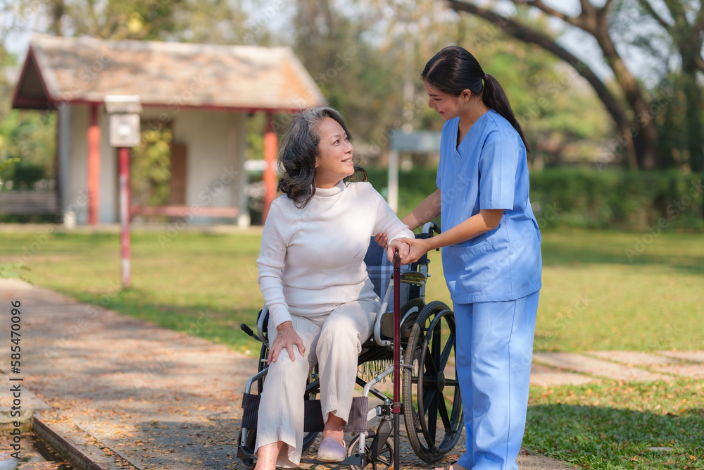 custom made wallpaper toronto digitalAsian nurse or physiotherapist caring for elderly woman sitting wheelchair
