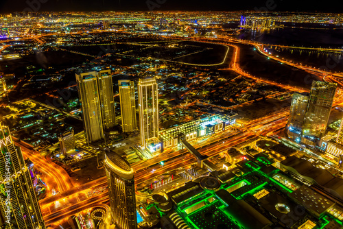 a picture of Downtown Dubai's urban infrastructure at night