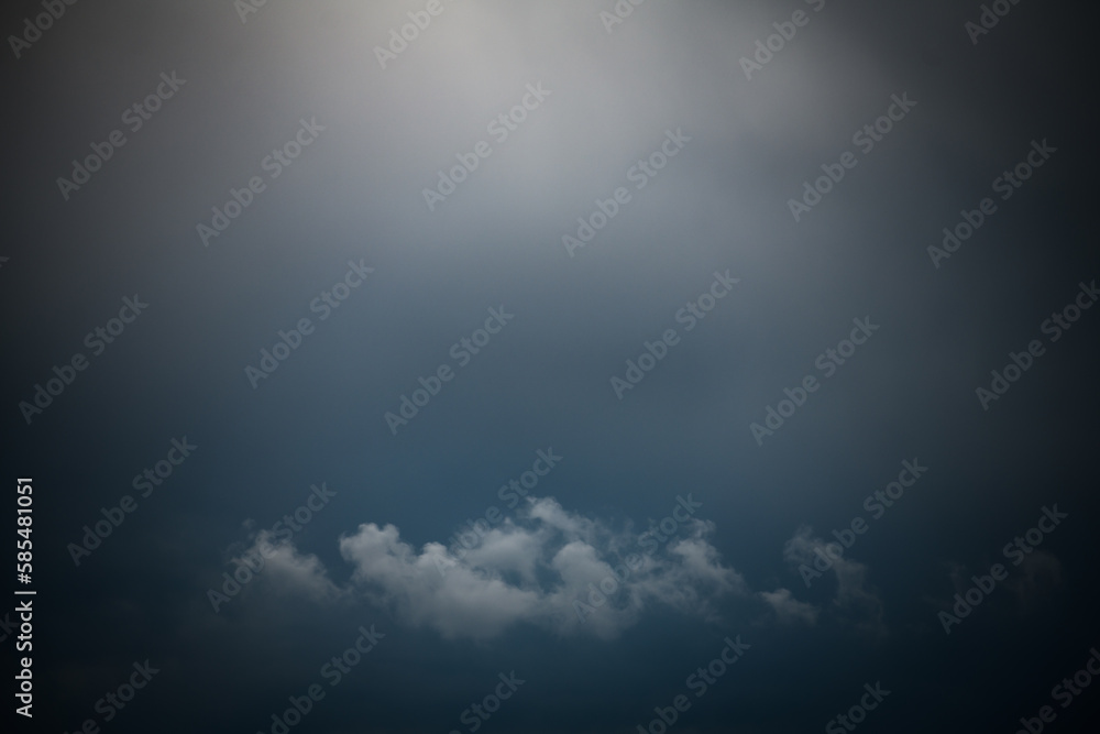 Obraz premium Natural background with dark stormy clouds on sky 