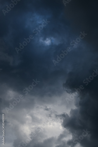 Natural background with dramatic and rainy grey clouds on sky