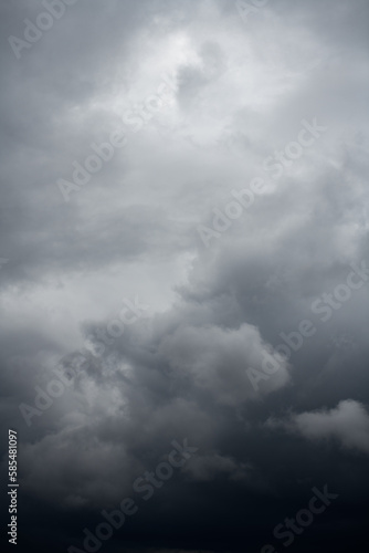 Natural background with dramatic and rainy grey clouds on sky