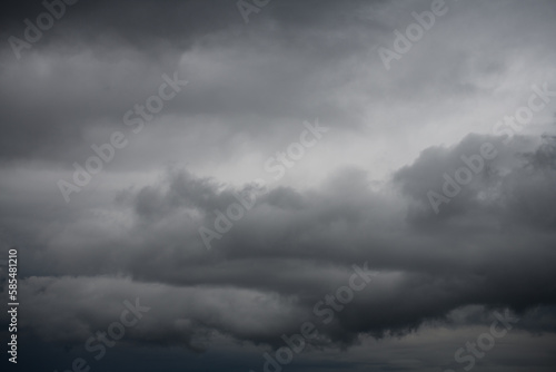 Natural background with dramatic and rainy grey clouds on sky © Dmytro Hai
