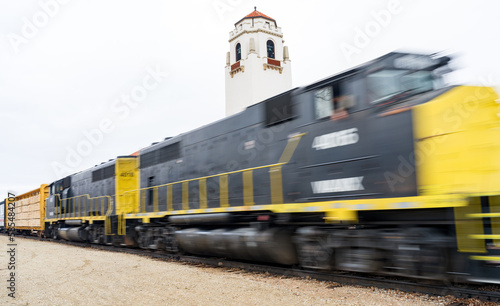 Diesel train motion blur before a train depot photo