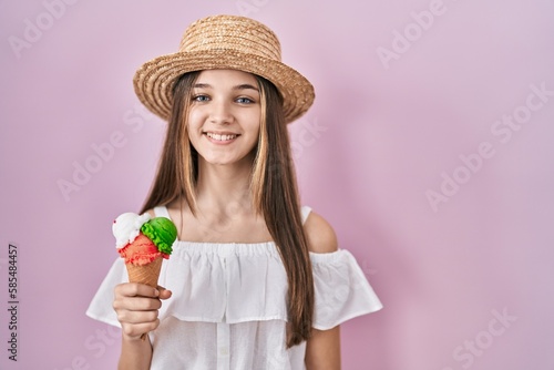 Teenager girl holding ice cream with a happy and cool smile on face. lucky person.