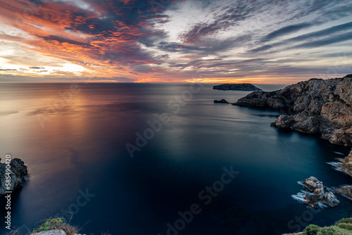 Dawn at the coastline of the Mediterranean Sea (Costa Brava, Illes Medes, Spain) photo