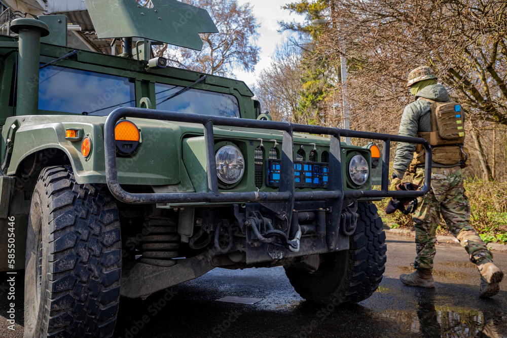 Kyiv. Ukraine. March 26, 2023. American Hummer and Ukrainian military at  war. Stock-Foto | Adobe Stock