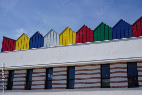 colorful beach houses on the roof of a building in Vendée, France