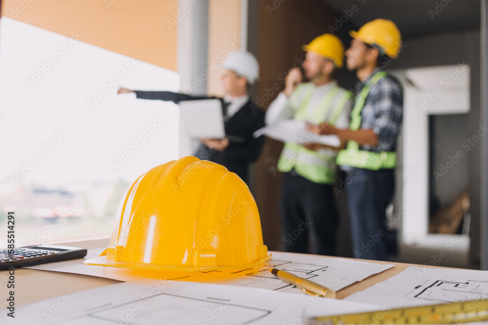 Diverse Team of Specialists Use Tablet Computer on Construction Site. Real Estate Building Project with Civil Engineer, Architect, Business Investor and General Worker Discussing Plan Details. Diverse Team of Specialists Use Tablet Computer on Construction Site. Real Estate Building Project with Civil Engineer, Architect, Business Investor and General Worker Discussing Plan Details.
