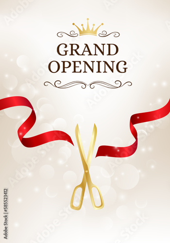 Grand opening banner with cut red ribbon and gold scissors.