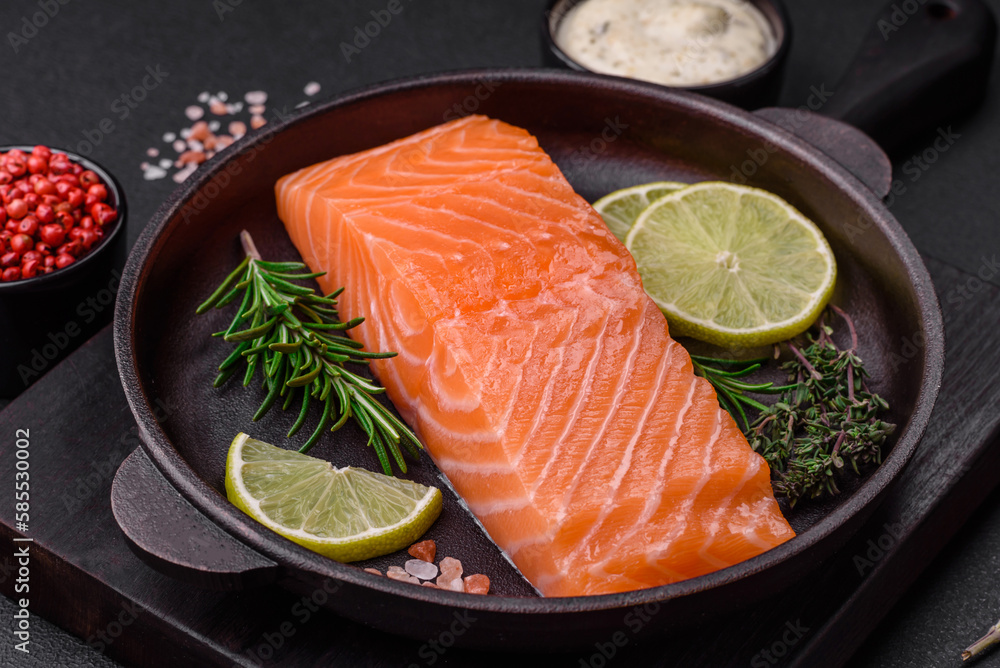 Fresh tasty raw red fish fillet with spices and herbs Fresh tasty raw red fish fillet with spices and herbs