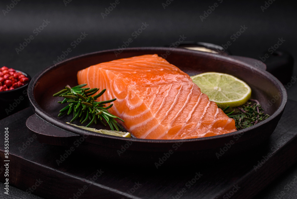 Fresh tasty raw red fish fillet with spices and herbs Fresh tasty raw red fish fillet with spices and herbs