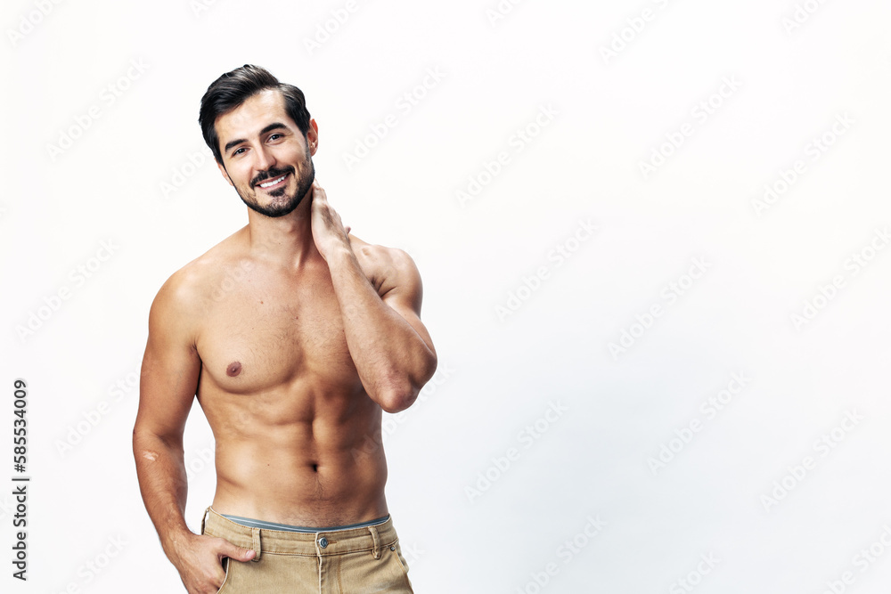 Fototapeta premium Male athlete model with naked torso and packs of abs sporty on white isolated background, trendy clothing style, copy space, space for text