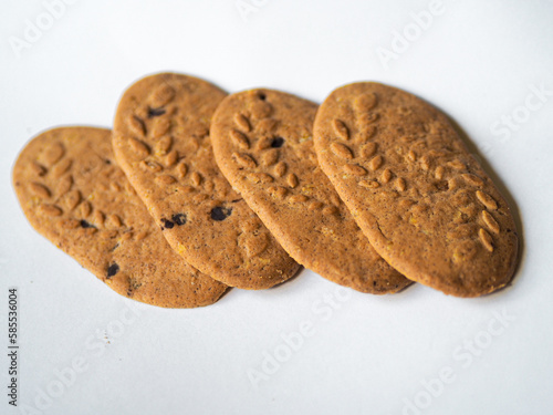 Cereal cookies with chocolate pieces on a white background. Healthy cookies photo
