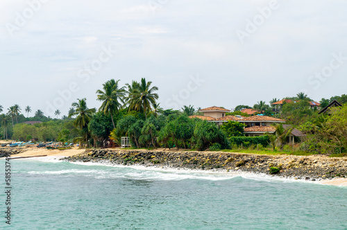 Beautiful tropical coast with a sandy beach. Photography for tourism background, design and advertising
