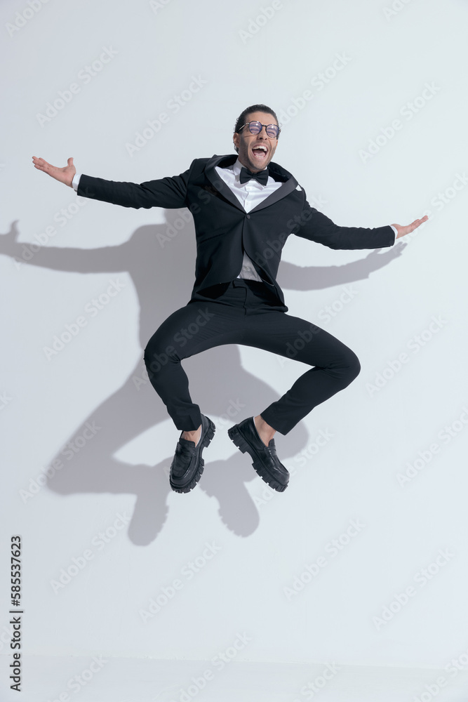 businessman squatting in the air full of excitement