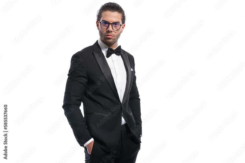 businessman posing with hands in pockets businessman posing with hands in pockets