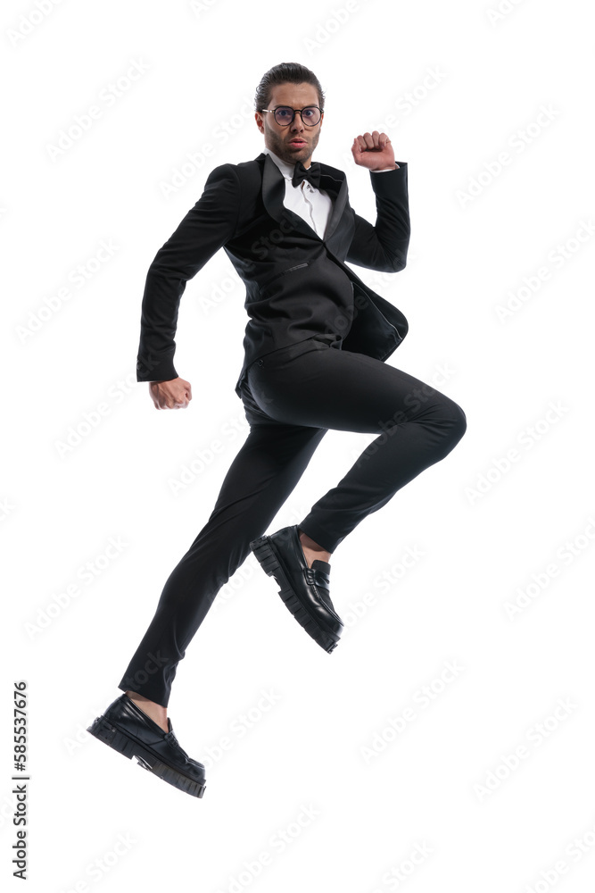 businessman jumping high into the sky