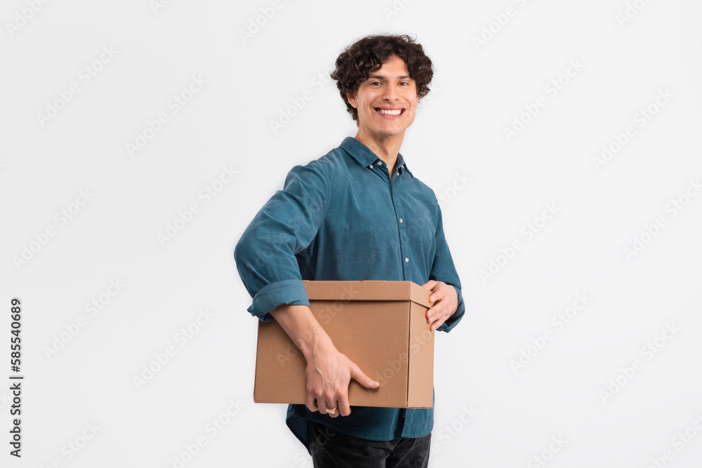 Cheerful Man Holding Cardboard Box Parcel Standing Over White Background