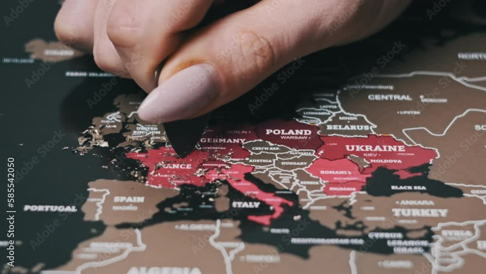 Scratching country of France on the Surface of Scratch World Map