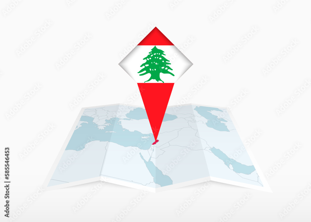 Obraz premium Lebanon is depicted on a folded paper map and pinned location marker with flag of Lebanon.