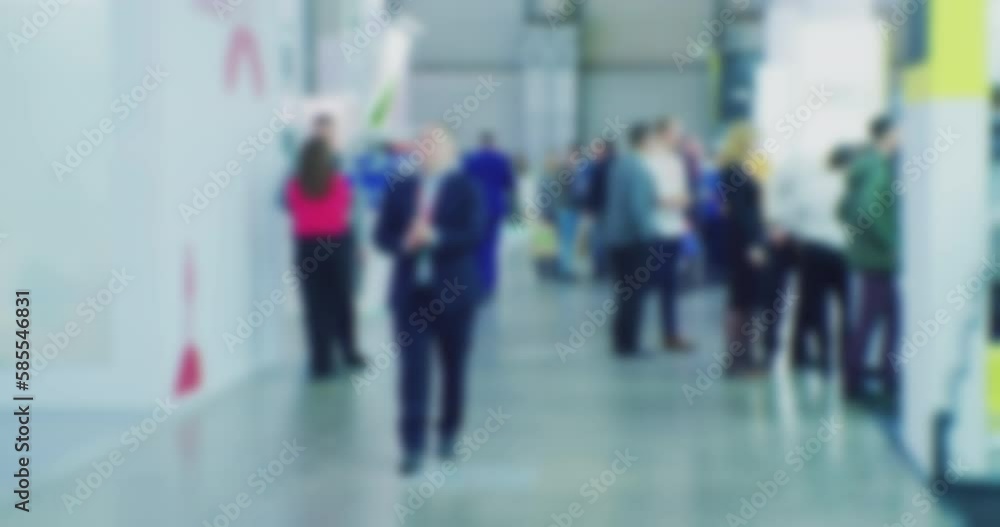blurred silhouettes of people who move inside a large building. slow motion video. blurred silhouettes of people who move inside a large building. slow motion video.