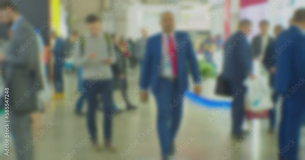 timelapse.modern business life in the city. defocused blurry video. background on the theme of business. blurry silhouettes of unrecognizable people moving fast in a large hall timelapse.modern business life in the city. defocused blurry video. background on the theme of business. blurry silhouettes of unrecognizable people moving fast in a large hall
