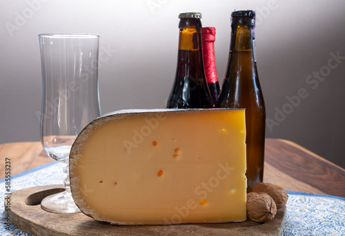 Cheese and beer pairing, Belgian beer and old yellow cow milk cheese from Bruges photo