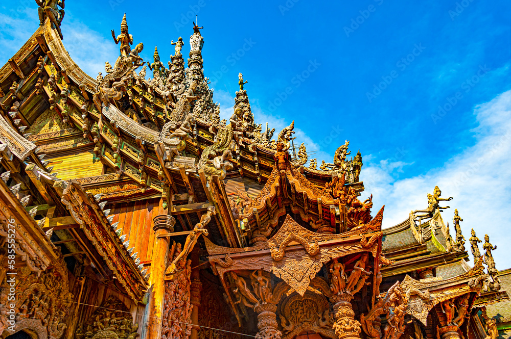 Pattaya, Thailand - December 29, 2018: Sanctuary of Truth, a magnificent wooden castle by the sea beautiful with sculptures and carvings that reflect the worldview of wisdom Pattaya, Thailand - December 29, 2018: Sanctuary of Truth, a magnificent wooden castle by the sea beautiful with sculptures and carvings that reflect the worldview of wisdom