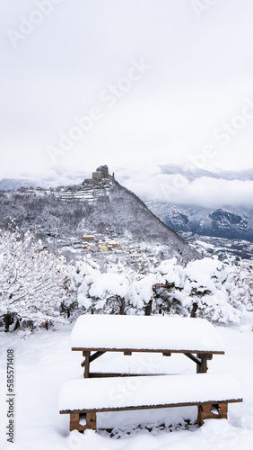 Image of the Ancient/ Abbey of San Michele built on Mount Pirchiriano located at the entrance of the Susa Valley, around the years between 983 and 987 A.D. with an abundant snowfall