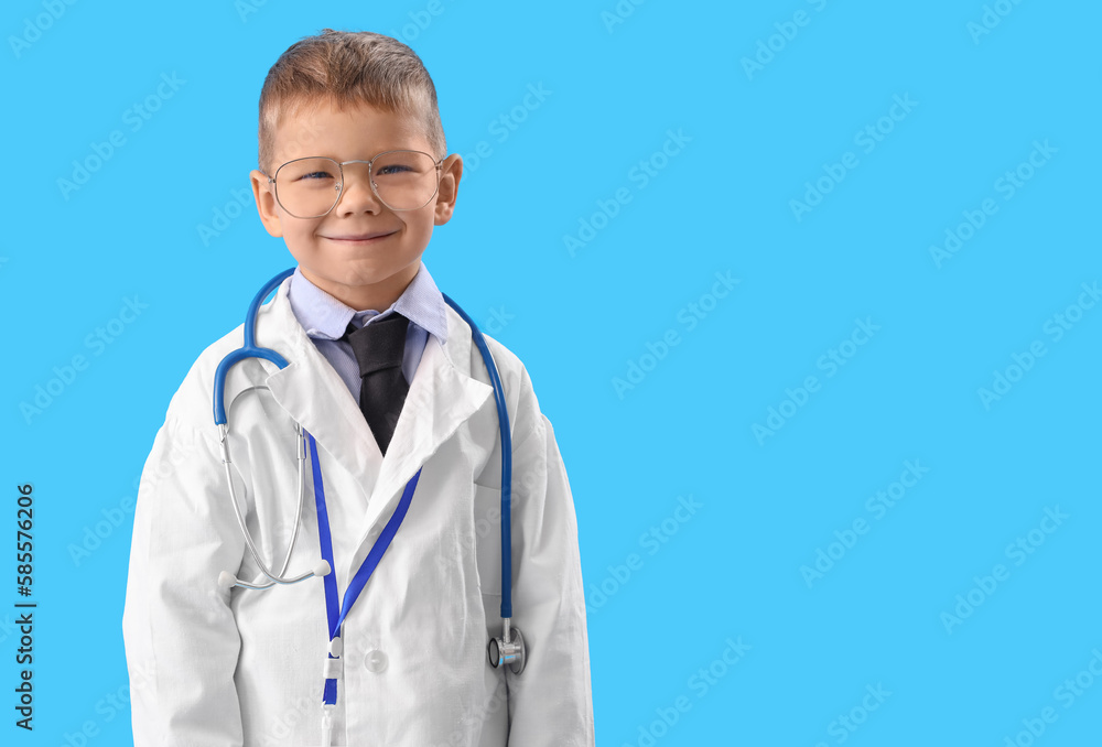 Cute little doctor in eyeglasses on blue background Cute little doctor in eyeglasses on blue background