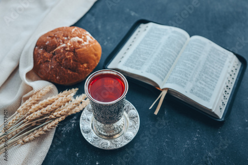 Obraz na płótnie Wine, bread and open bible, communion concept