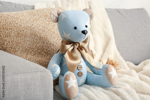 Toy bear with pillow and pl...