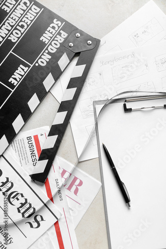 Clipboard with film, newspa...