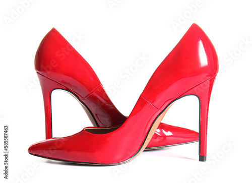 Pair of red high heeled shoes on white background