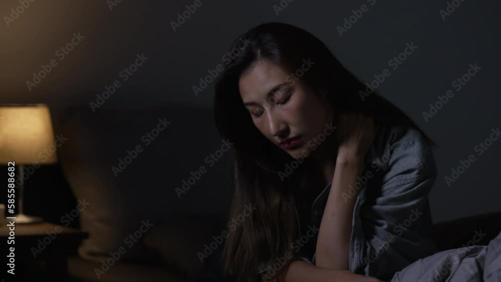 Depressed young Asian woman can not sleep from insomnia Depressed young Asian woman can not sleep from insomnia