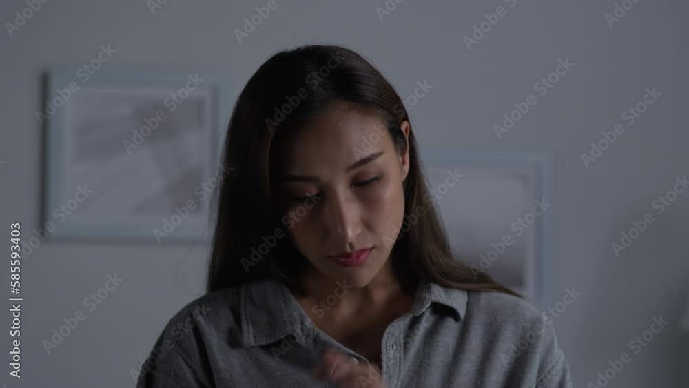 Young Asian woman feeling sad tired and worried suffering depression in mental health. Young Asian woman feeling sad tired and worried suffering depression in mental health.