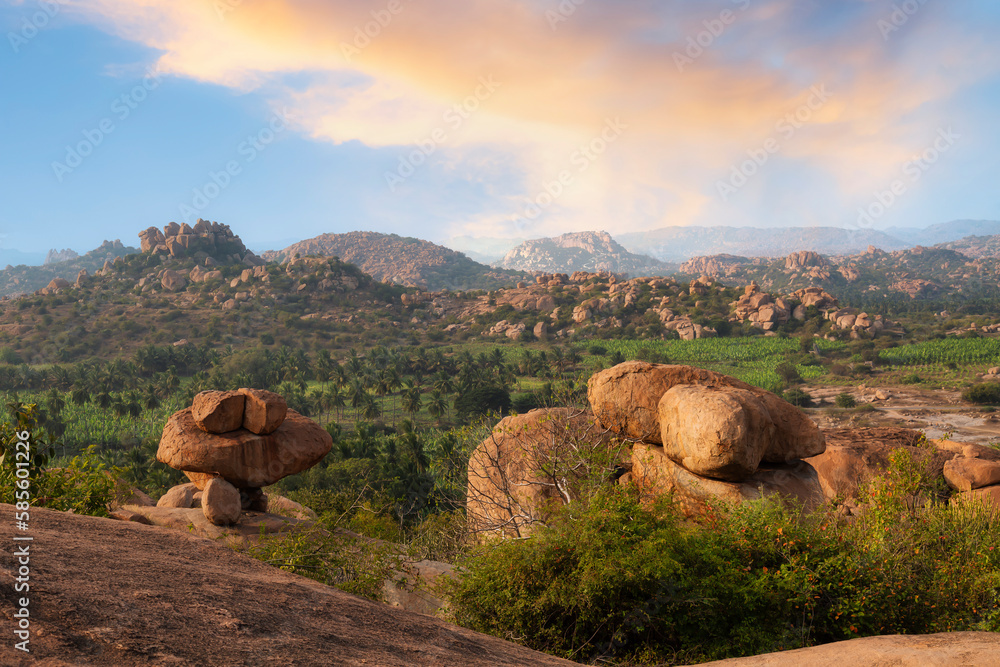 Hampi landscape aerial view at sunset from a hill top at Karnataka, India